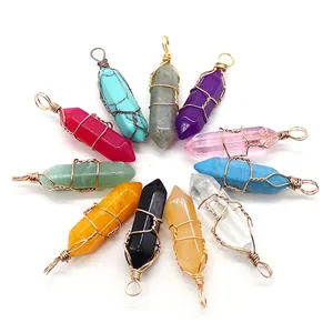 Handmade wire wrapped hexagonal crystal point pendants in ten natural gemstones