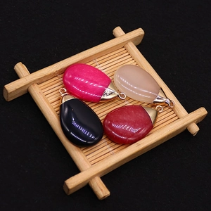 Polished teardrop stone pendants in multiple colors with gold caps for DIY necklaces