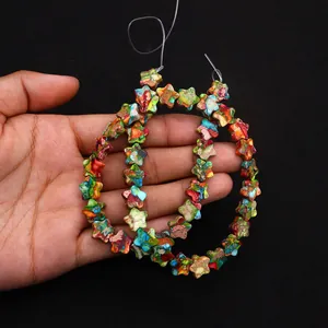 Macro view of colorful star-shaped natural stone beads for DIY jewelry making