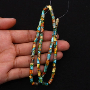 Macro shot of colorful cylindrical imperial jasper beads for DIY jewelry making