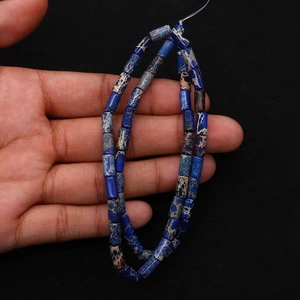 Macro shot of blue imperial jasper cylinder beads for DIY jewelry making