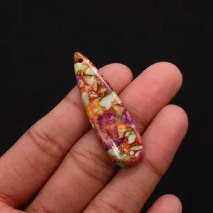 Macro view of teardrop imperial stone pendant with colorful mosaic textures and top hole