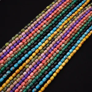 Perline a botte ovali colorate in pietra naturale per creazione di collane e gioielli