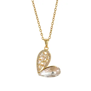Modische Goldkette mit Kleeblatt-Anhänger und Baguette-Zirkonia im Herzdesign