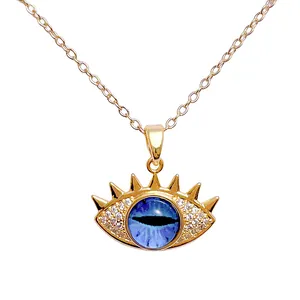 Goldene Evil Eye Halskette mit blauem Auge und funkelnden Zirkoniasteinen besetzt