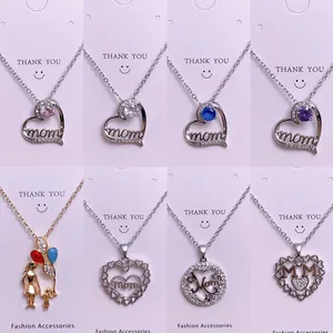 Elegantes collares MOM en forma de corazón en plata y oro con piedras de circón de color
