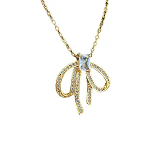 Collier nœud plaqué or avec pendentif en zircone et chaîne fine pour femmes élégantes