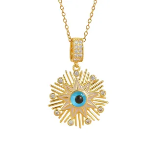 Golden Evil Eye pendant necklace with sunburst white enamel and sparkling zircon accents