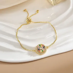 Bracciale a fiore placcato in oro con pietre colorate e chiusura a scorrimento regolabile
