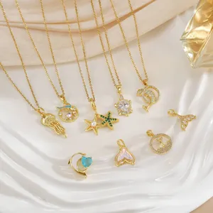 Collana in Acciaio al Titanio Mondo Oceanico per Donna Placcata in Oro 18K Zirconia Tartaruga Marina Delfino Medusa Ciondolo