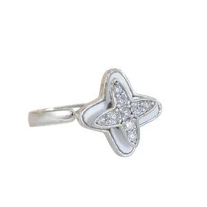 Rotating star ring in silver with white enamel and sparkling zircon pave for women