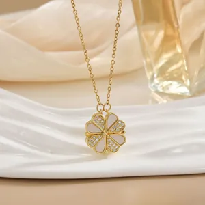 Golden clover pendant necklace with white mother of pearl and cubic zirconia stones
