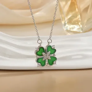 Convertible silver four-leaf clover necklace with green hearts and diamond center