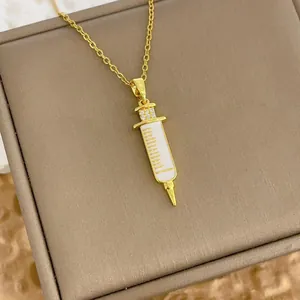 Creative 18k gold plated syringe pendant necklace with white enamel and sparkling crystals