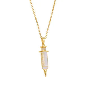 Creative 18k gold plated syringe pendant necklace with white enamel and zircon stones