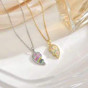 Friendship heart necklace set with rainbow enamel and cubic zirconia in gold and silver
