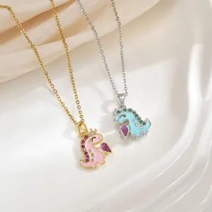 Sweet magnetic dinosaur necklaces for couples featuring gold and silver chains with enamel pendants