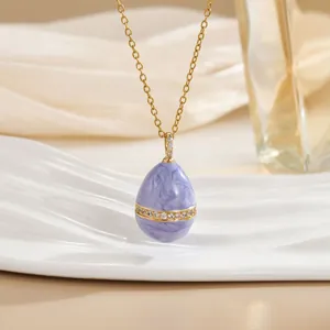 18K gold-plated geometric egg pendant necklace with purple enamel and zircon inlay
