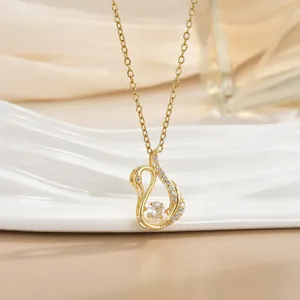 Elegant gold swan pendant necklace with sparkling crystals and fine chain link