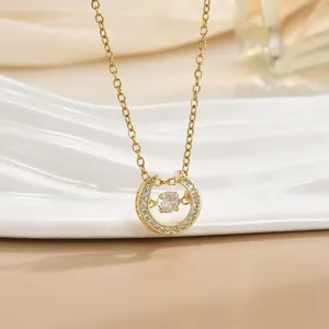 Detail of horseshoe pendant necklace with pavé stones and a floating center diamond