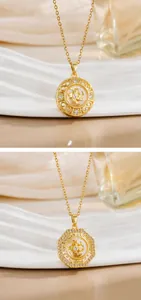 Macro detail of rotating gold windmill pendants with pavé crystals on dainty steel chains