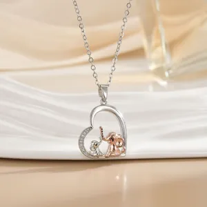 Silberne Herz-Halskette mit Roségold-Elefantenanhänger und funkelnden Zirkon-Akzenten