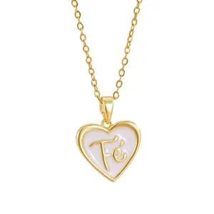 Elegant gold titanium heart necklace with pink enamel and Fé engraving pendant