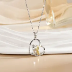 Detail of heart necklace with Always my mother forever my friend engraving and crystals