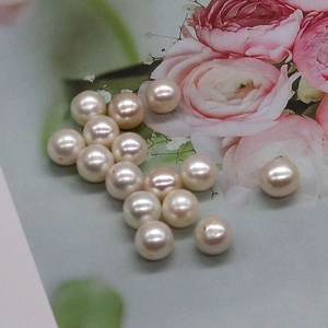 Macro shot of high-luster near-round freshwater pearls for DIY jewelry making accessories