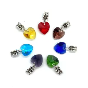 Colorful heart-shaped crystal stone pendants with decorative silver bails in seven colors