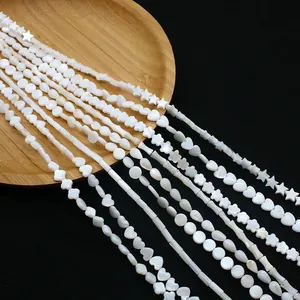 Assortiment natuurlijke witte schelpkralen in ster- en hartvorm voor DIY-sieraden