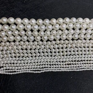 Polished white imitation pearl beads in various sizes for DIY jewelry making and crafts
