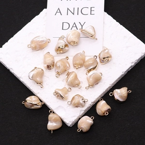 Natural sea shell tooth shaped connector with gold rings for DIY jewelry making