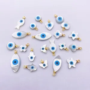 Evil Eye shell pendants collection with mother of pearl texture and gold plated hooks
