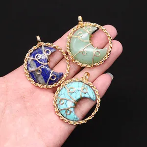 Handcrafted crescent moon natural stone pendants with gold wire wrap in round frames