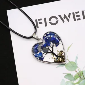 Lapis lazuli stone heart shaped tree of life pendant with black cord necklace