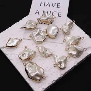 Baroque pearl connector charms with gold trim and dual links for DIY jewelry making