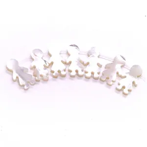 Cuentas de nácar natural de concha blanca con forma de muñequita para crear joyería
