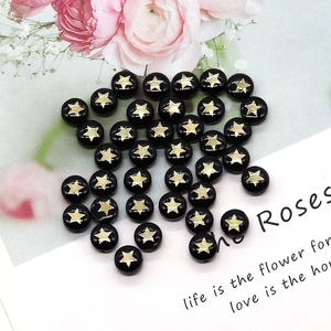 Flat round black shell beads with gold star prints for DIY necklace jewelry making