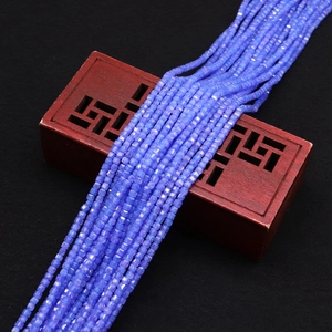 Macro detail of faceted light blue cubic zirconia square beads for DIY jewelry making