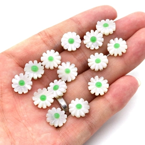 Handheld white shell daisy beads with green center for DIY necklaces and bracelets