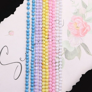 Cuentas redondas facetadas macaron para hacer joyas en azul, rosa y amarillo