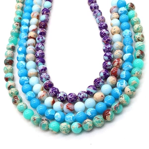 Round natural stone beads in purple and blue hues with unique mineral textures for DIY jewelry