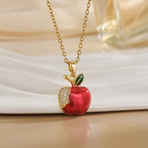 Exquisite Christmas apple pendant necklace with pavé crystal detail and gold chain