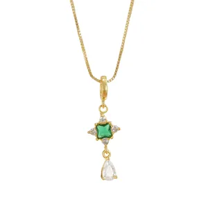 Gold plated titanium necklace featuring a green square gemstone and zircon pendant