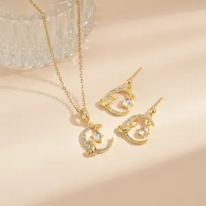 Goldenes Mond und Katze Schmuckset mit Halskette und Ohrringen mit Himmelssternen