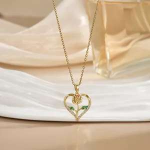 Exquisite gold heart necklace featuring a red rose and sparkling white crystals for women