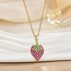 Elegant strawberry heart pendant necklace with red and green crystals on golden chain