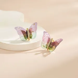 Boucles d'oreilles papillon dorées avec ailes dégradées violettes et zircons brillants