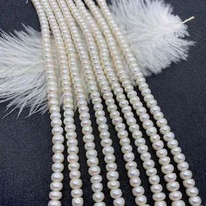 Natural white freshwater pearls 3-10mm strands for jewelry making on white feather